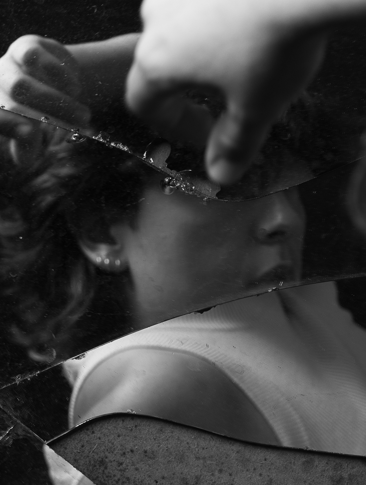 Held in the Blur portrait reflected and fragmented in a mirror